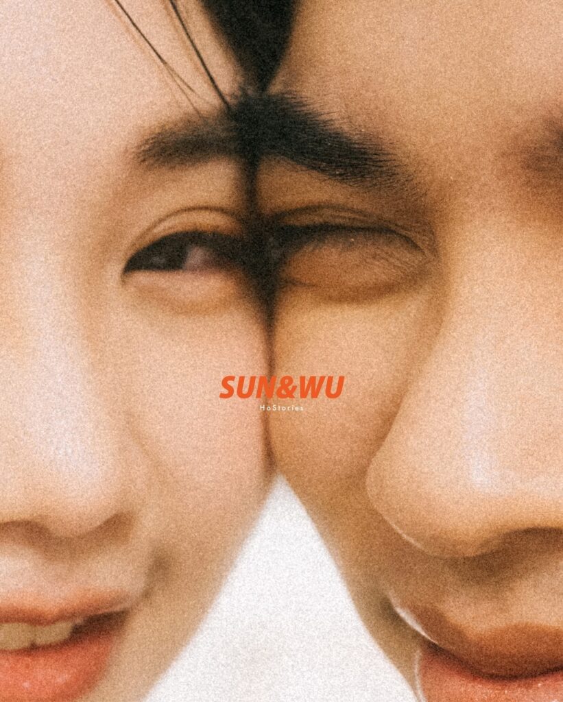 Tightly cropped couple portrait with a playful wink